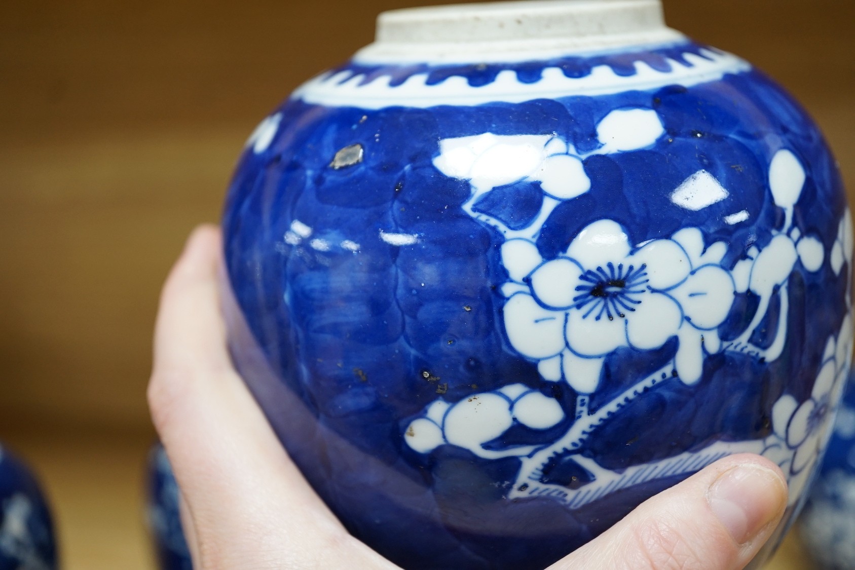Four Chinese blue and white ‘prunus’ jars, tallest 14cms high